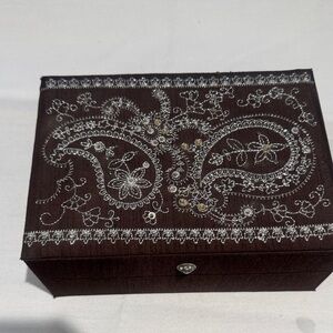 Brown paisley sequined jewelry box with mirror and ring holder.